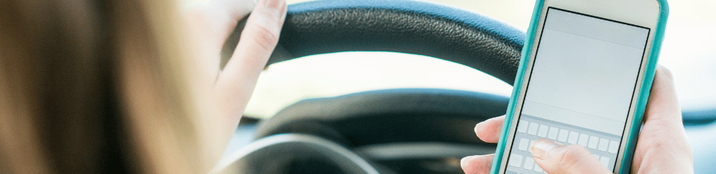 Woman texting and driving