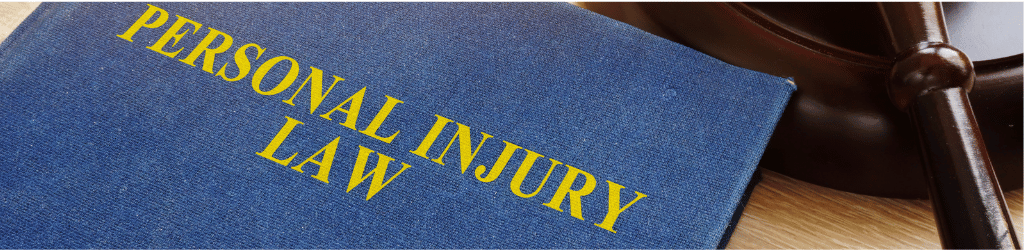 Blue book titled "Personal Injury Law"